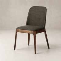 Rhys Armless Dining Chair in Bilton Olive with wooden legs and rounded backrest.