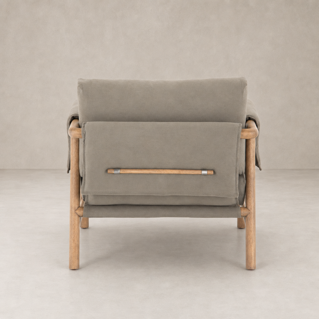 Mykonos Chair in Villa Olive featuring a sleek design and natural wood accents.