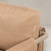 Mykonos Chair in Palermo Nude with a textured leather finish and soft cushions.