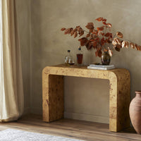 Close-up of the Perrin Console Table showcasing its unique burl wood finish and curved edges.