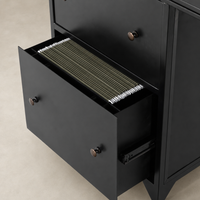 Kestrel Box Executive Desk in black with a filed drawer showcasing hanging folders.