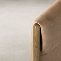 Remington Chair in Palermo Nude showing smooth leather and elegant wooden armrest.