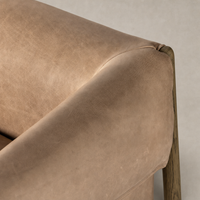 Close-up of the Remington Chair in Palermo Nude, showcasing soft, textured leather.