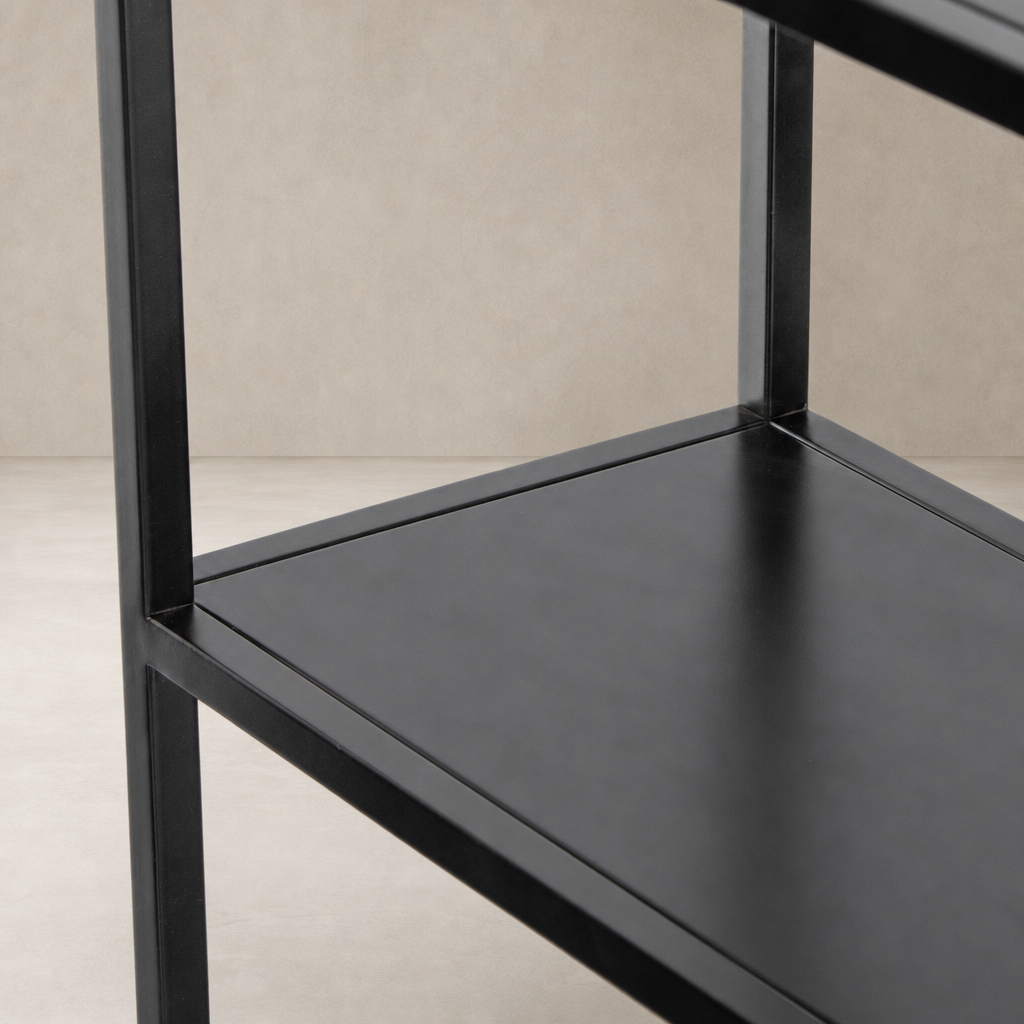 Sleek black Fez Bookcase showcasing minimalist metal frame and spacious shelves.