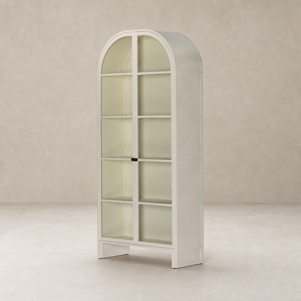 Cream powder-coated Delta Cabinet featuring an arched design and glass doors.