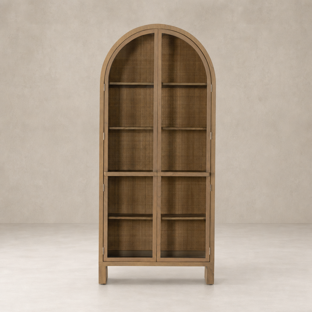 Priya Cabinet in burnished Mindi features an arched top and spacious shelving.
