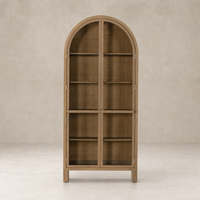 Priya Cabinet in burnished Mindi features an arched top and spacious shelving.
