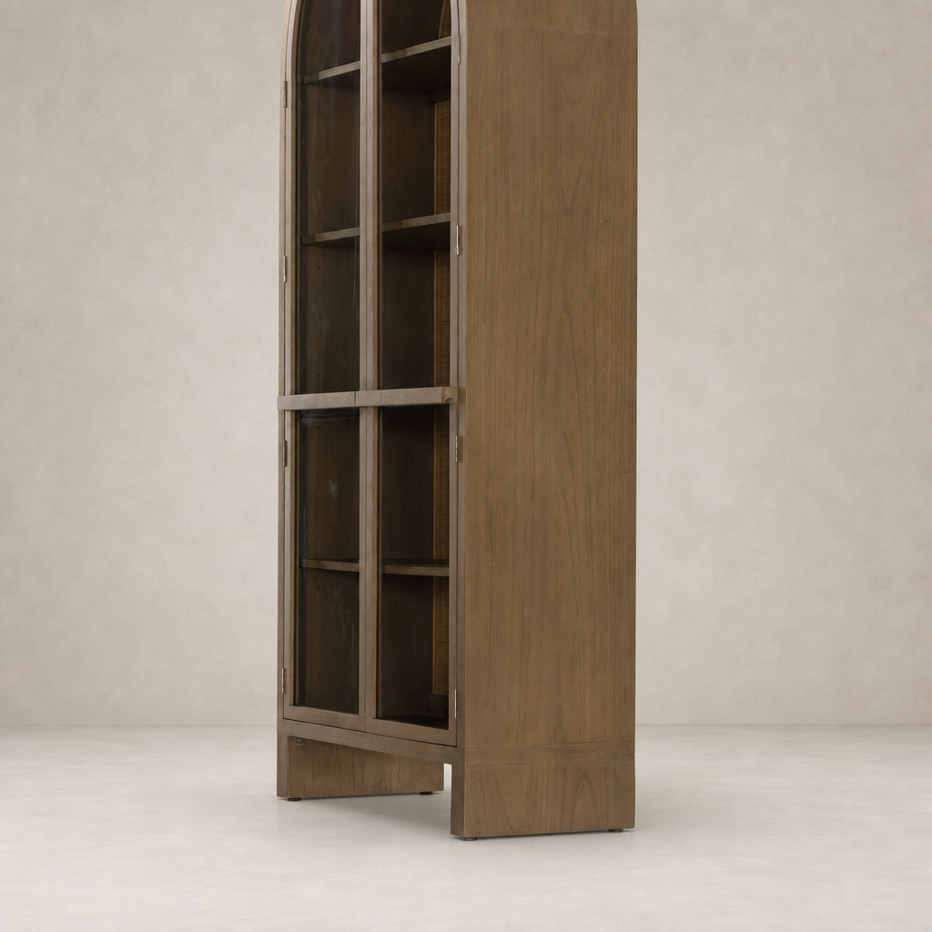 Priya Cabinet in burnished Mindi showcasing an elegant arched top and spacious shelving.