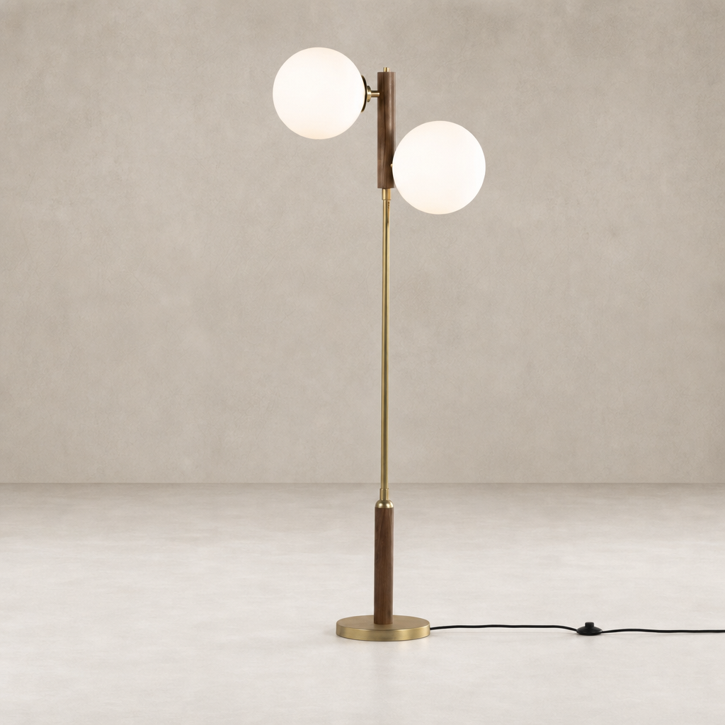 Aged brass floor lamp with dual glass globes and a wooden accent.