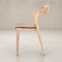 Amato Dining Chair in Sonoma Butterscotch, featuring curved wooden back and cushioned seat.