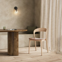Amato Dining Chair in Sonoma Butterscotch, featuring a curved back and natural wood finish.