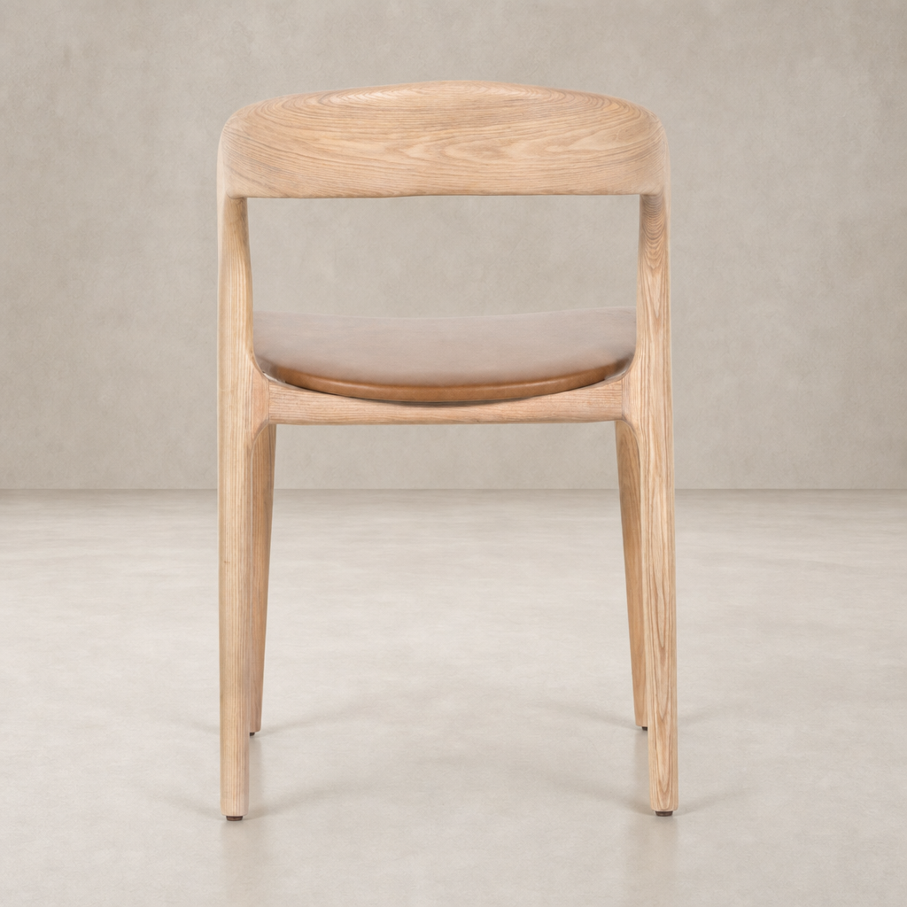 Amato Dining Chair in Sonoma Butterscotch with a gentle curve and sleek wooden design.
