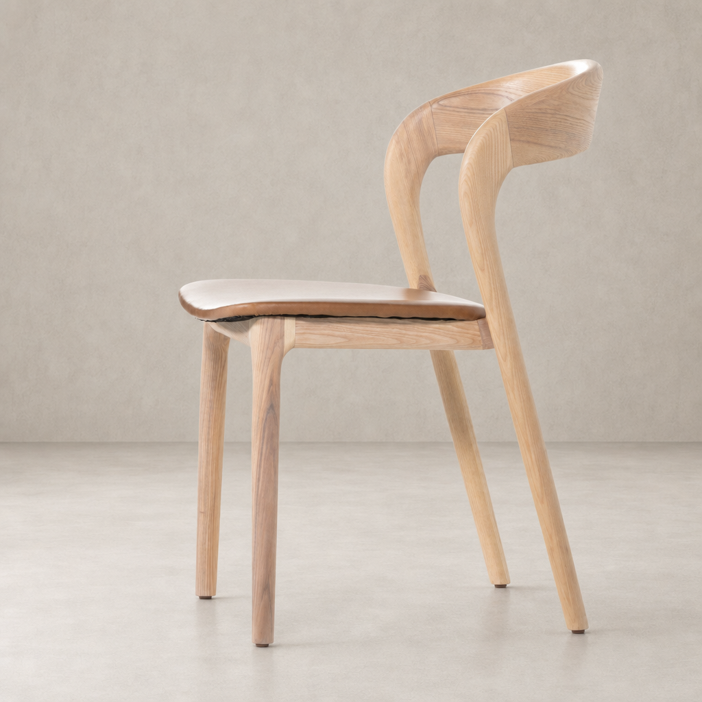 Amato Dining Chair in Sonoma Butterscotch showcases sleek curves and a natural wood finish.