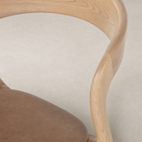 Amato Dining Chair in Sonoma Butterscotch showcasing smooth curves and rich texture.