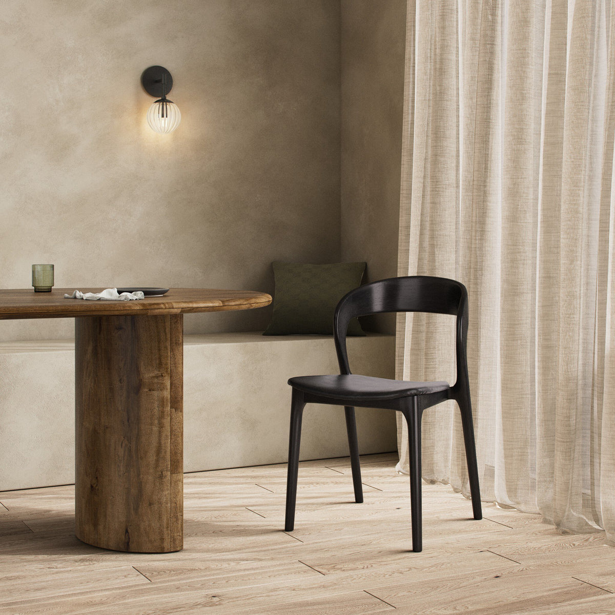 Amato Dining Chair in Sonoma Black, featuring a sleek design in a modern dining setting.