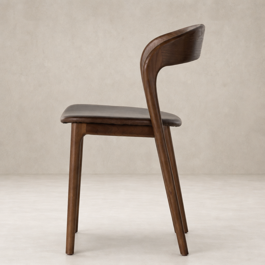 Amato Dining Chair in Sonoma Coco with a sleek, curved back and smooth finish.