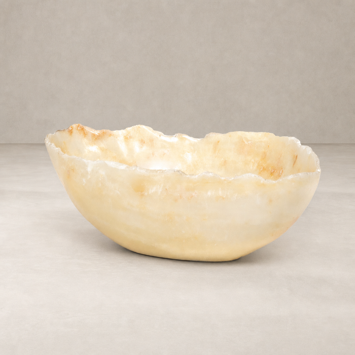 Jet Live Edge Bowl in onyx features a unique, organic shape and textured finish.