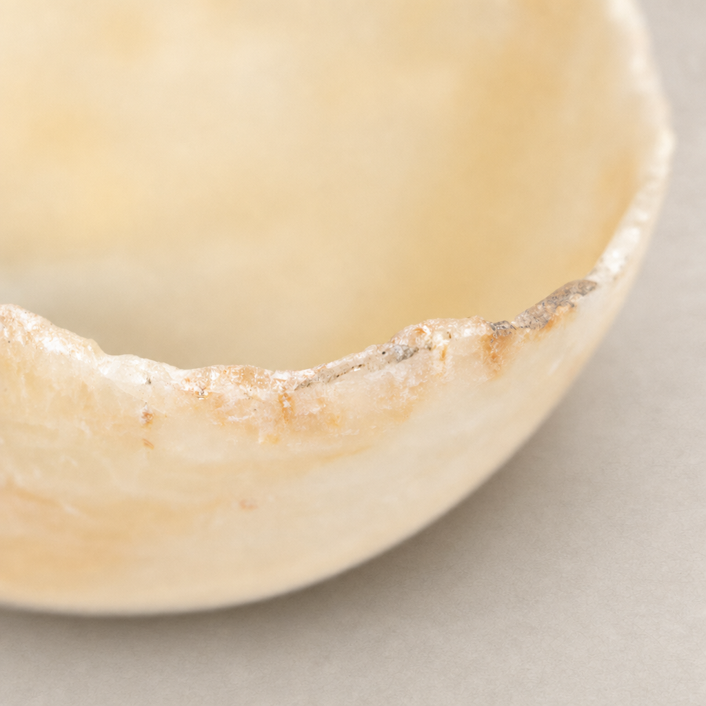 Onyx Jet Live Edge Bowl showcasing a smooth, organic shape with natural texture.