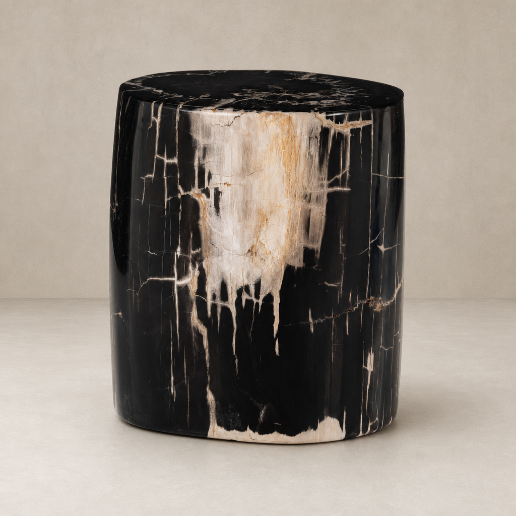 Naxos End Table features a striking black and gold marbled finish with a sleek cylindrical shape.