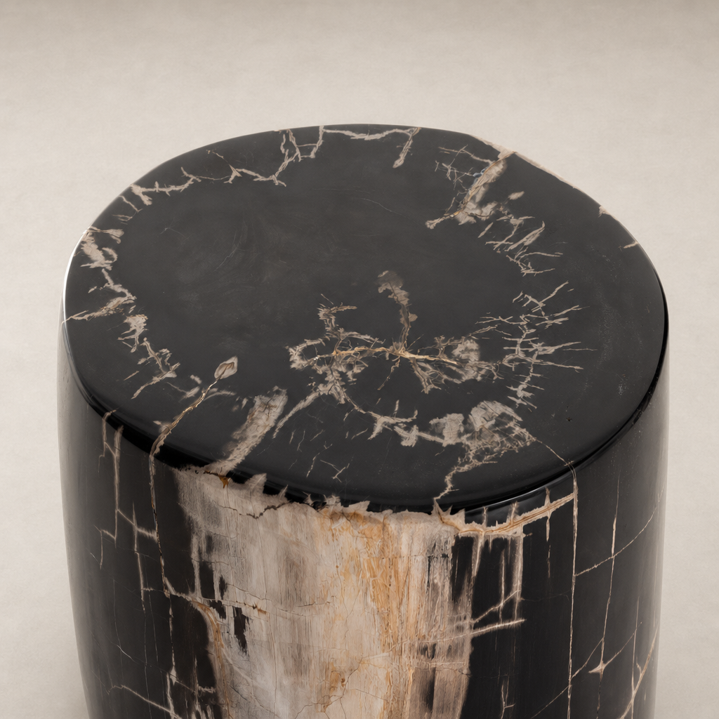 Naxos End Table features a polished black surface with striking natural patterns and textures.