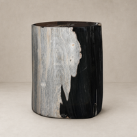Naxos End Table features a cylindrical design with unique wood grain patterns.