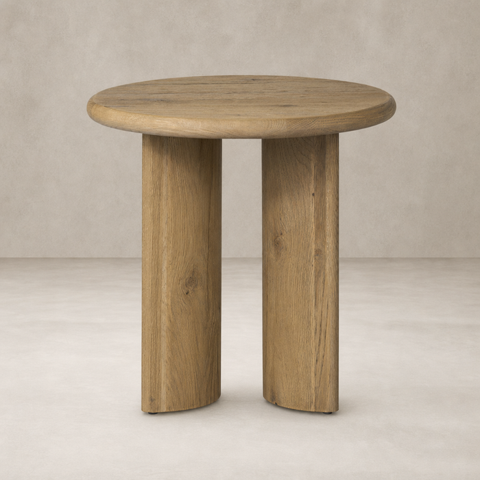 Alden End Table with round top and sturdy wooden legs in a natural finish.