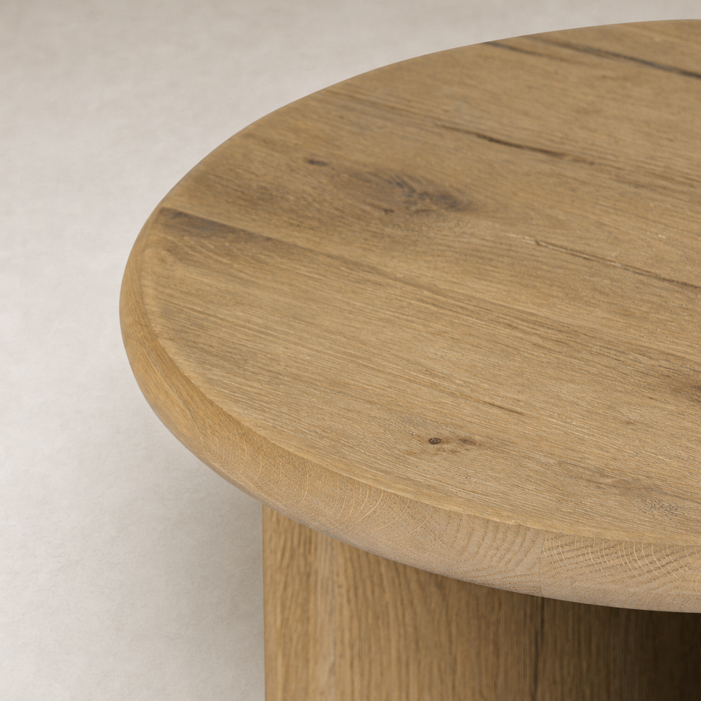 Alden End Table features a round, natural wood tabletop with visible grain texture.