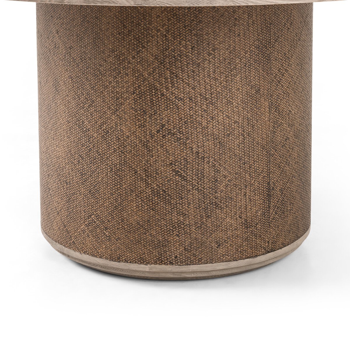 Close-up of the Kaia Round Dining Table's textured brown base, showcasing its modern design and craftsmanship.