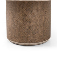 Close-up of the Kaia Round Dining Table's textured brown base, showcasing its modern design and craftsmanship.