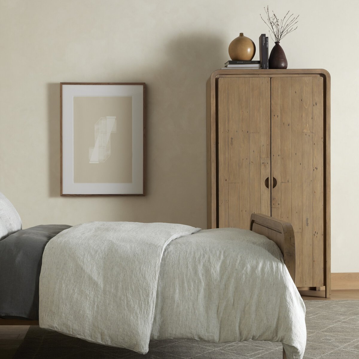 Rustic wooden Solana Cabinet in a cozy bedroom setting, offering stylish storage and display options.