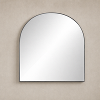 Elena Wide Mirror in matte black iron with a stylish arch shape.