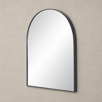 Elena Wide Mirror features a sleek, arched design with a matte black iron frame.