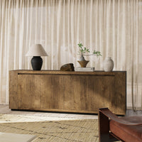 Biscay Sideboard in rustic wormwood oak featuring sleek lines and natural wood grain.