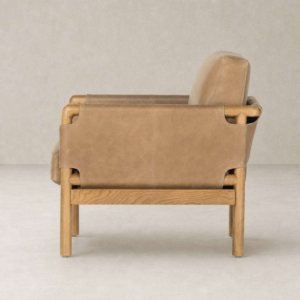 Soleil Chair in Palermo Drift featuring curved lines and wooden legs for a modern look.