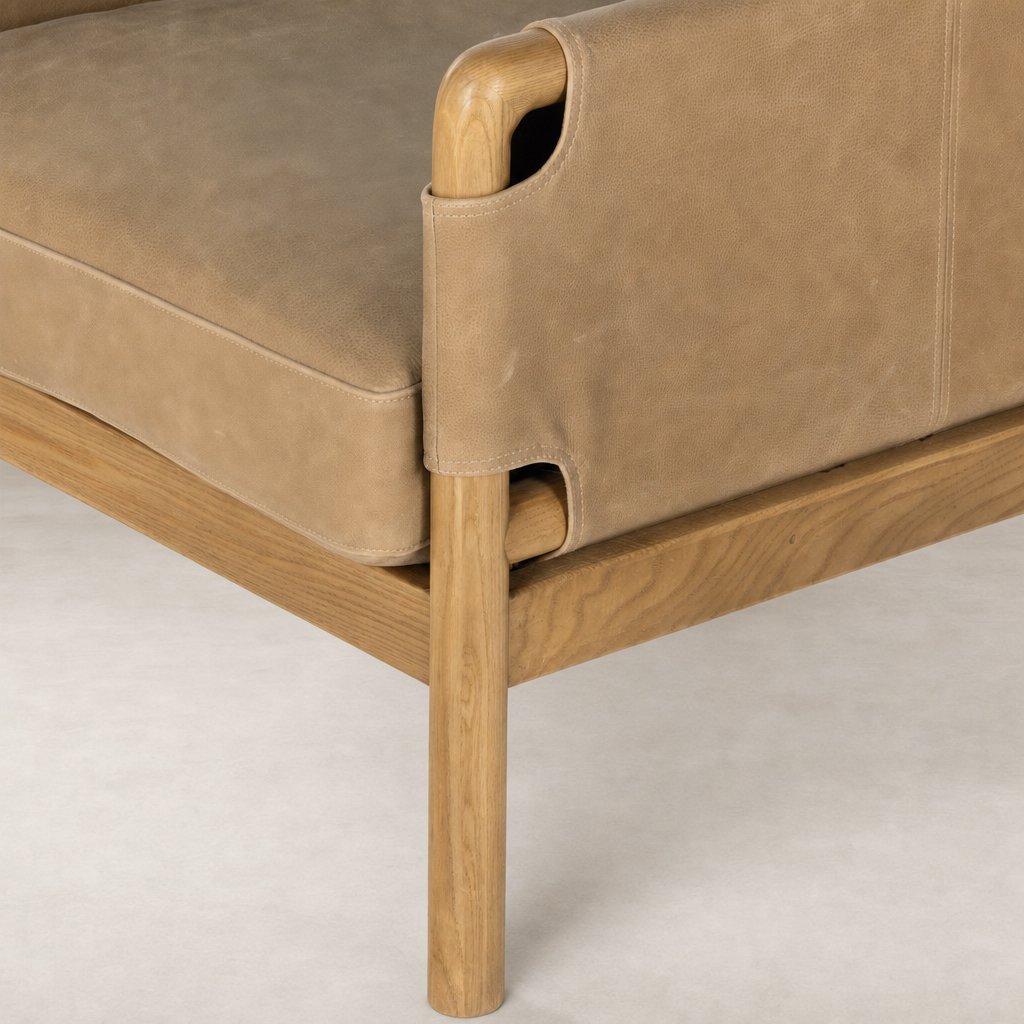 Soleil Chair in Palermo Drift with smooth leather and natural wooden frame.