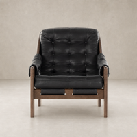 Langston Chair in heirloom black with tufted leather and sturdy wood frame.