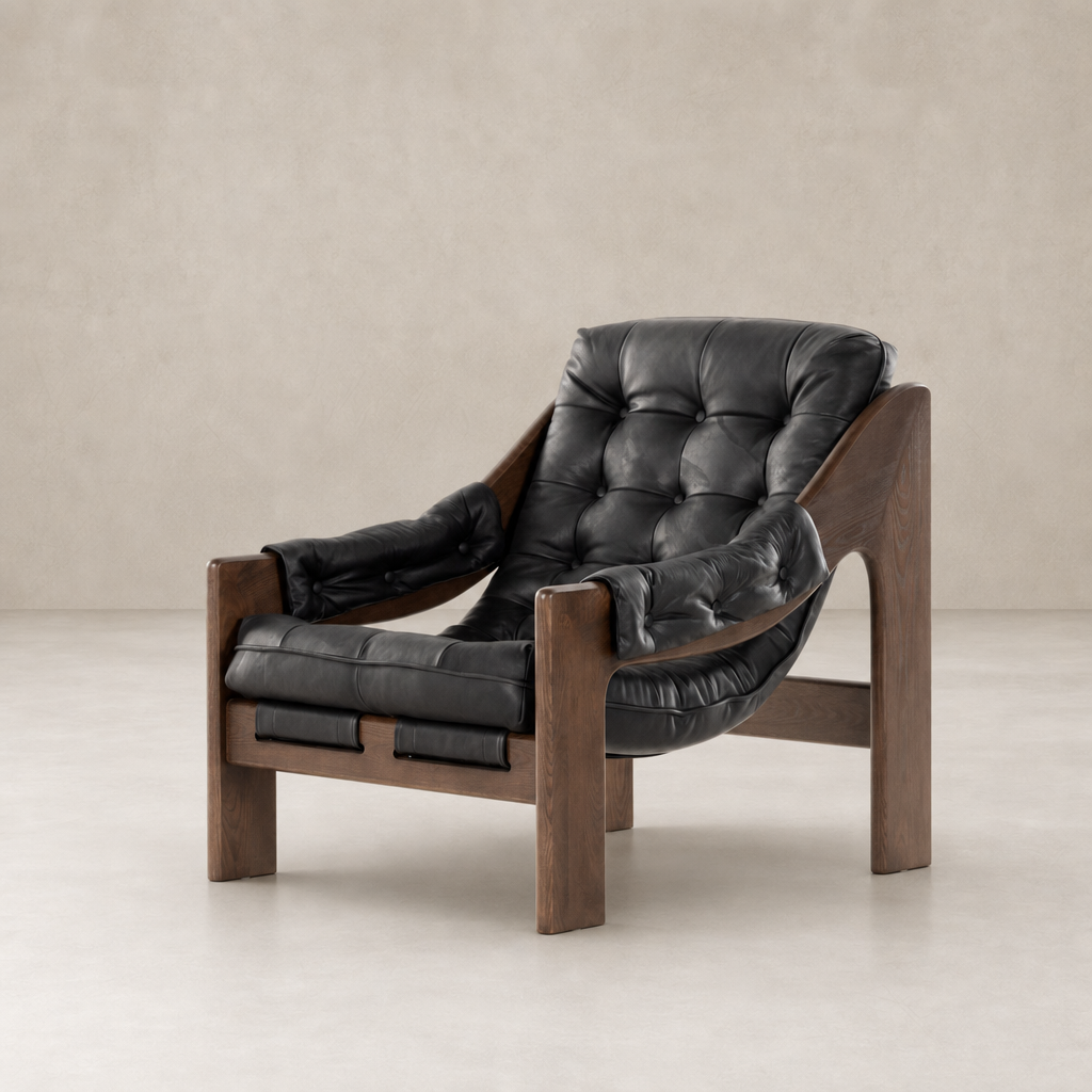 Langston Chair in Heirloom Black with plush cushions and wooden armrests.