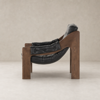 Langston Chair in heirloom black features a sleek design with plush cushions and wooden frame.
