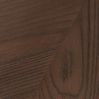 Heirloom Black wood close-up showcasing Langston Chair's rich texture and grain.
