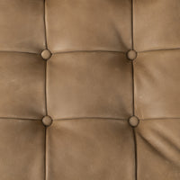 Detailed close-up of the Palermo Drift leather upholstery on the Langston Chair.