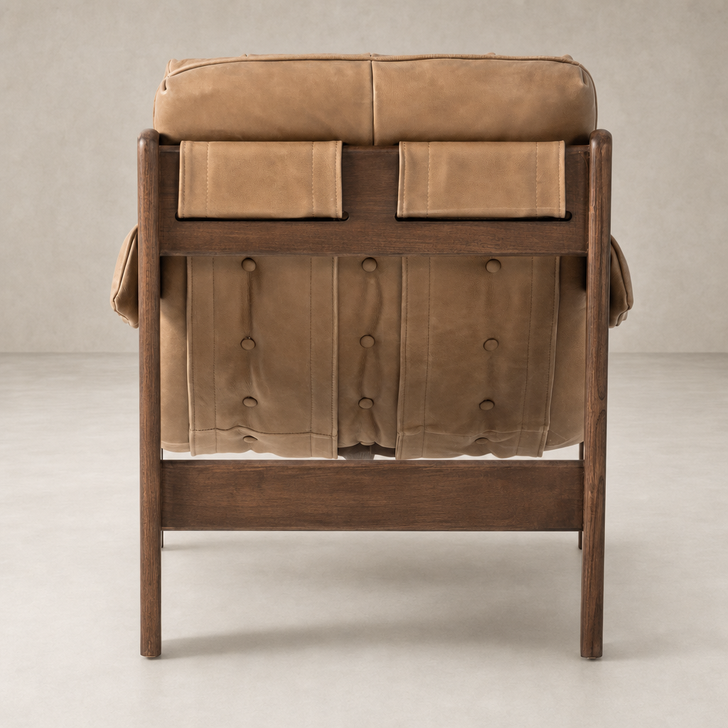 Langston Chair in Palermo Drift featuring a tufted back and wooden legs.
