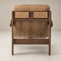 Langston Chair in Palermo Drift featuring a tufted back and wooden legs.