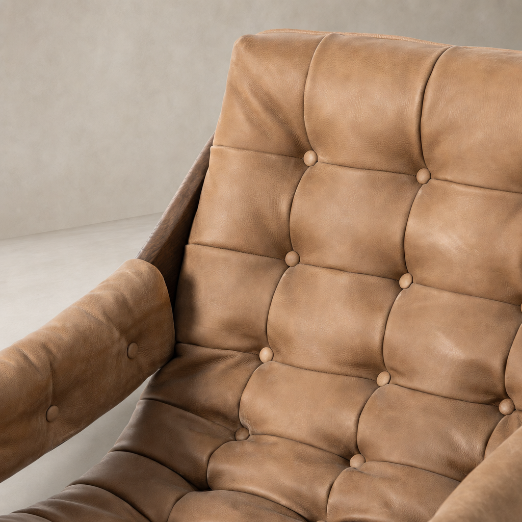 Langston Chair in Palermo Drift featuring plush, tufted upholstery and stylish armrests.