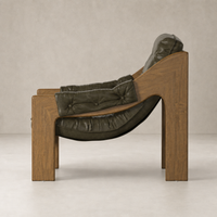 Langston Chair in Dulane Moss, featuring a unique wood frame and plush seating.