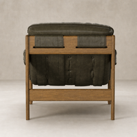 Langston Chair in Dulane Moss featuring a button-tufted back and sturdy wooden frame.