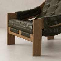 Langston Chair in Dulane Moss featuring plush green leather and a sturdy wooden frame.