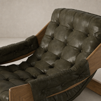 Langston Chair in Dulane Moss features plush tufted upholstery and rich wooden frame.