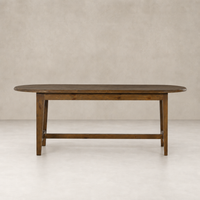 Savona Dining Table in waxed pine with an oval shape and sturdy legs.