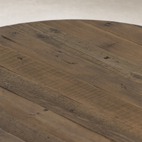 Close-up of the Savona Dining Table in waxed pine, showcasing its rustic wood texture.