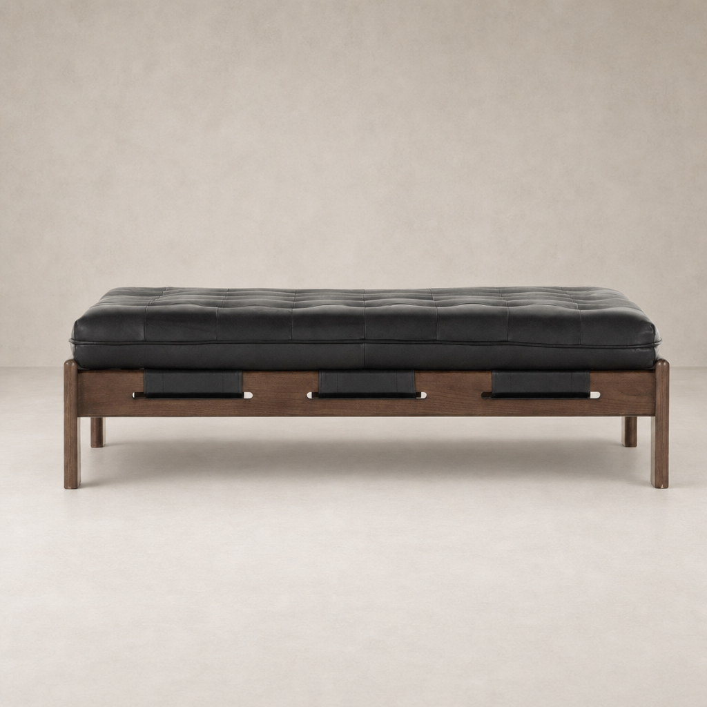 Hudson Cocktail Ottoman in Heirloom Black with tufted top and wooden base.